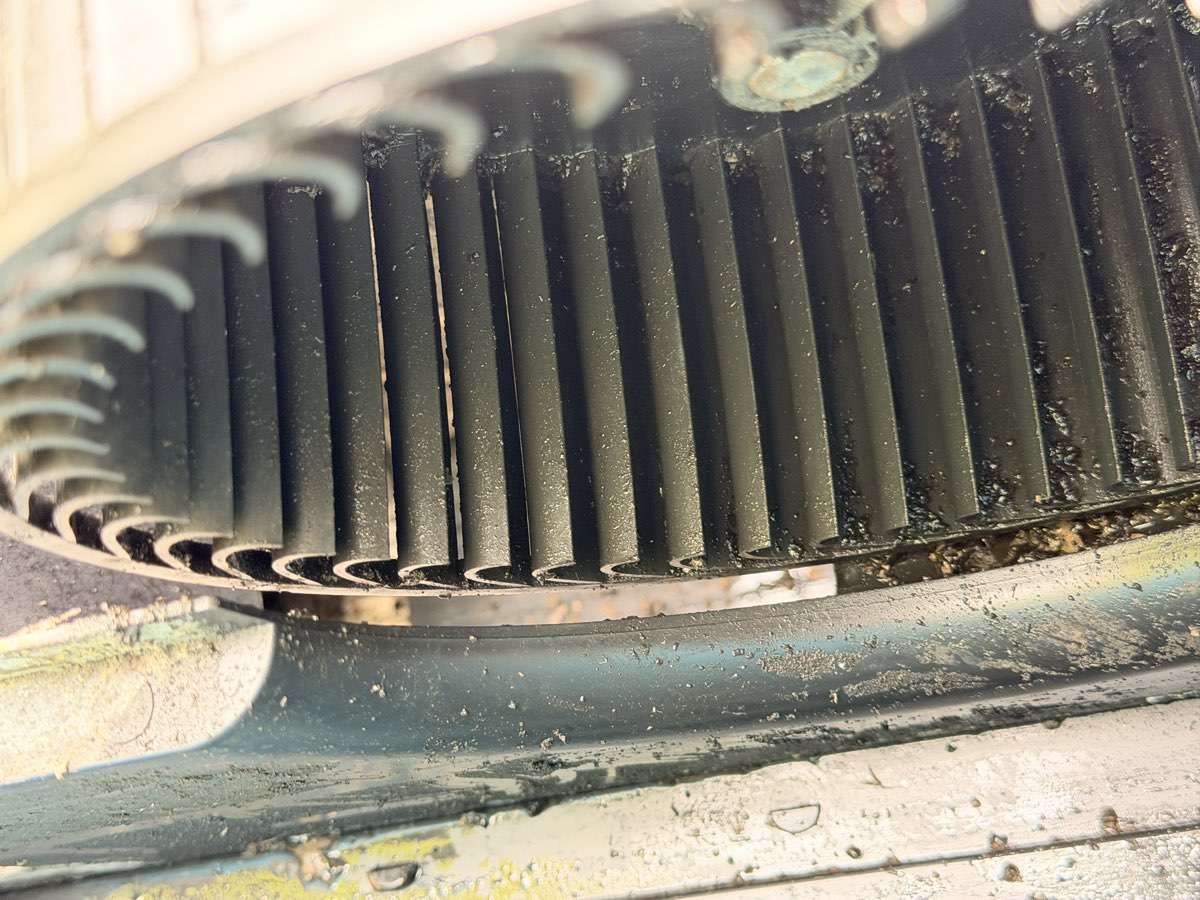RV air conditioner blower fins after cleaning — clean black fins